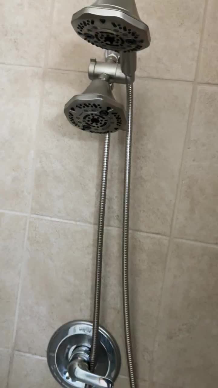 PlumbingPro North Atlanta — dual-head plus handheld shower combo installed on a ceramic-tile wall